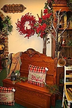 Do like Bellevue Florist and keep distinct styles in separate areas. The Nashville, Tennessee shop is divided into four sections: woodsy Christmas (pictured above), funky Christmas, modern Christmas and traditional Christmas.