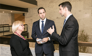 Jo Buttram, AAF, AMF, PCF, of Shirley’s Flowers & Gifts (shown with aides of Sen. Tom Cotton). 