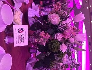 The luncheon bouquets and centerpieces featured beautiful American grown roses, peonies, stock, tulips, lilies, protea, Bells of Ireland, alstromeria, bupleurum, dianthus, freesia, lisianthus, ranunculus, viburnum, waxflower, ferns, leatherleaf and curly willow.
