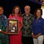 Sandy Nielsen Baumann and Raya Ward of Nielsen’s Florist and Garden Shop in Darien, Connecticut, accept 2016 Marketer of the Year honors from SAF’S Chief Content & Publishing Officer and Floral Management Editor in Chief Kate Penn and Dwight Larimer, AAF, PFCI, of DESIGN MASTER color tool, inc., which sponsors the award’s $5,000 prize.