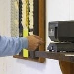 a person punching a time clock