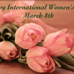 Pink roses on a table promoting Women's Day