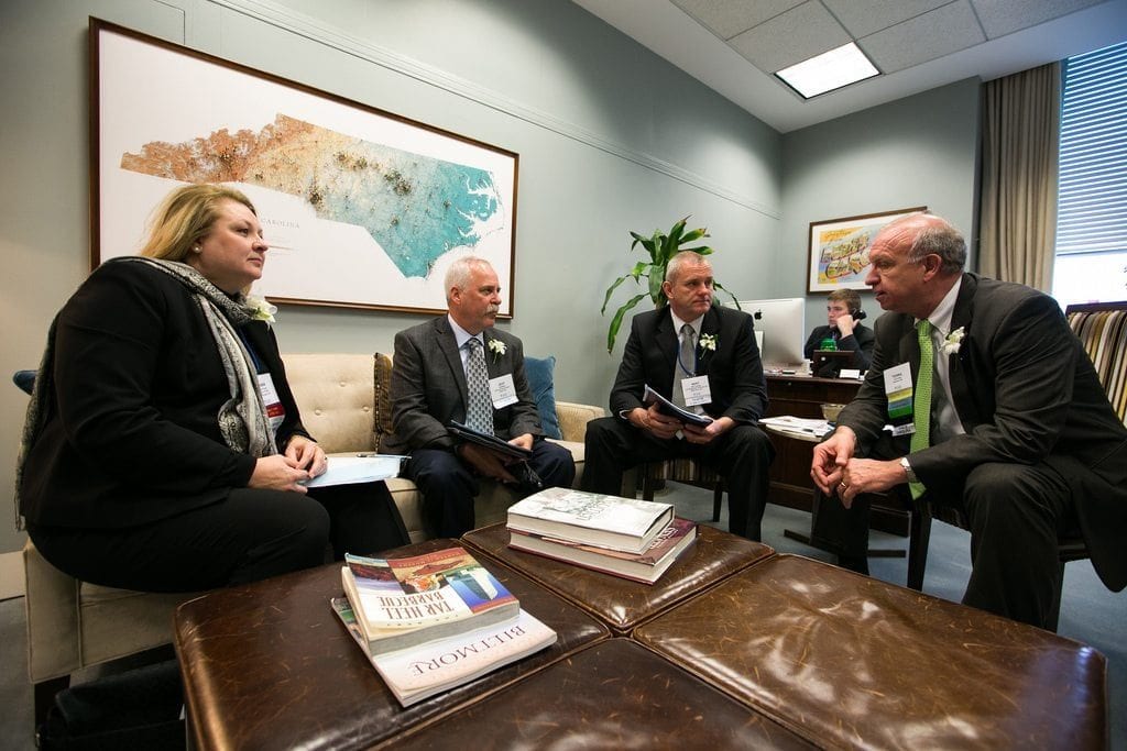 Bert Lemkes (second from right) Bert Lemkes (center), general manager of Tri-Hishtil, talked to The Washington Post about his perspective on E-Verify. He and a group of floral industry members from North Carolina discussed the issues with lawmakers and staff at past Congressional Action Days.