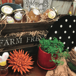 Organizing tables into vignettes with themed merchandise encourages browsing (and impulse buying).