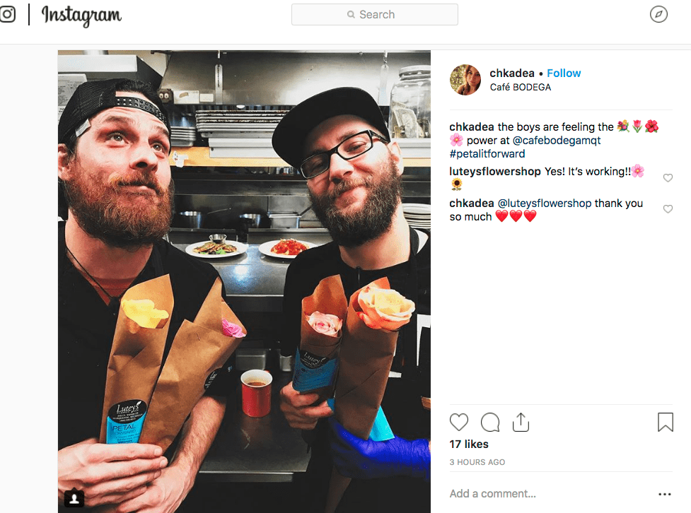 Two happy recipients shout-out their love for flowers (and Lutey’s Flower Shop in Marquette, Michigan) during Petal It Forward