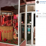 Lured by a window display with a kissing booth, couples in Pocomoke City, Maryland, have been stopping in Enchanted Florist to take a photo and place their Valentine’s Day order.